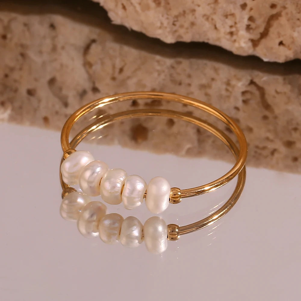 Minimalist Western Glam: Gold-Tone Rings Adorned with Freshwater Pearls