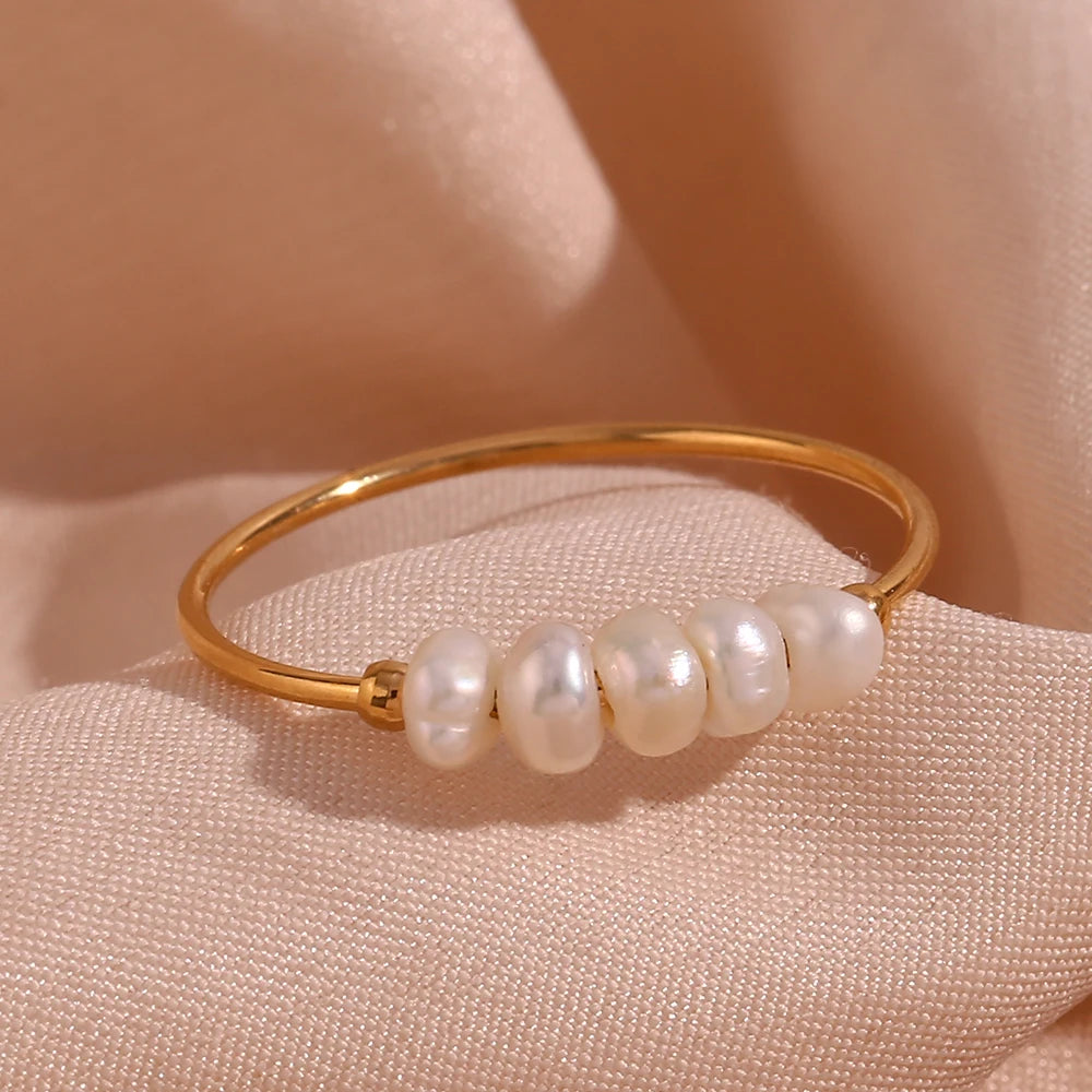 Minimalist Western Glam: Gold-Tone Rings Adorned with Freshwater Pearls