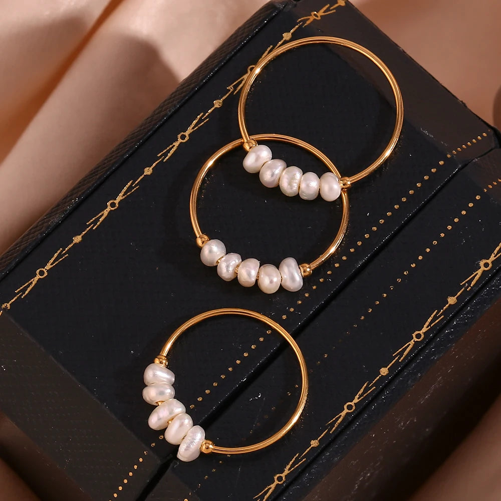 Minimalist Western Glam: Gold-Tone Rings Adorned with Freshwater Pearls