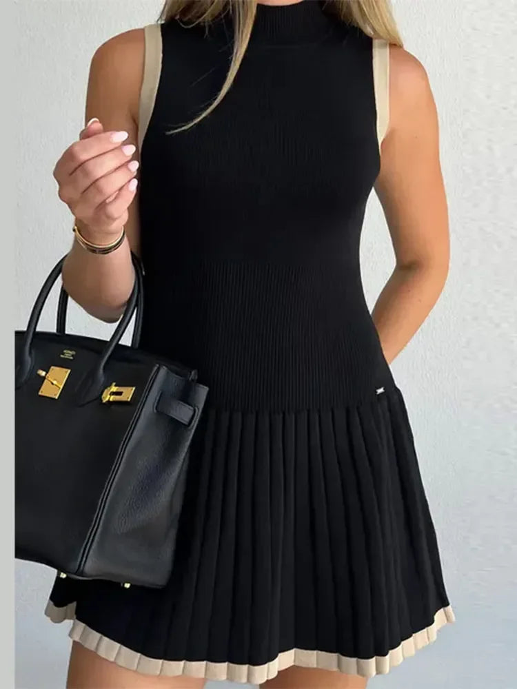 Trendy Black Ribbed Knit Mini Dress - Sleeveless with Pleated Hem