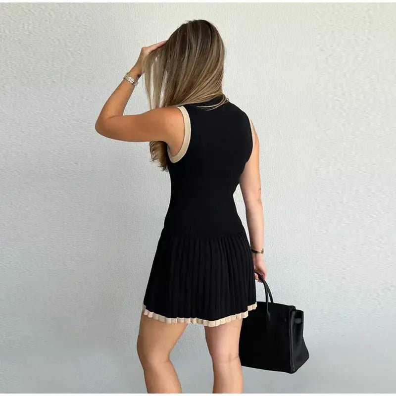 Trendy Black Ribbed Knit Mini Dress - Sleeveless with Pleated Hem