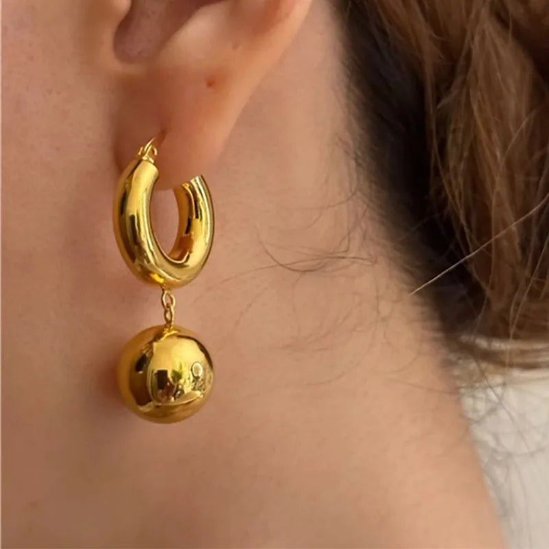 Statement Western Elegance: Chunky Gold Hoop Earrings with Ball Drop