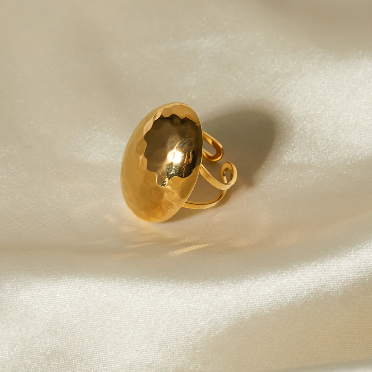 Modern Elegance: Chunky Gold Oval Ring with Hammered Finish