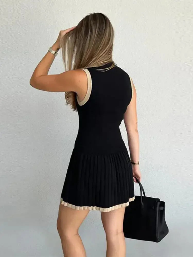 Trendy Black Ribbed Knit Mini Dress - Sleeveless with Pleated Hem