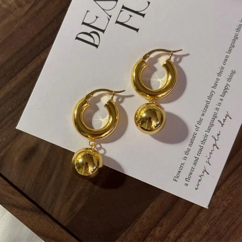 Statement Western Elegance: Chunky Gold Hoop Earrings with Ball Drop