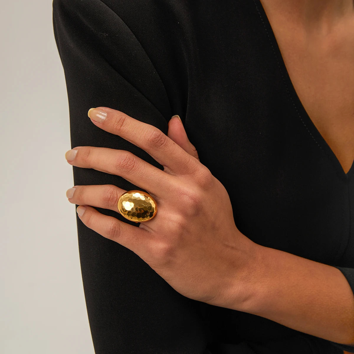 Modern Elegance: Chunky Gold Oval Ring with Hammered Finish