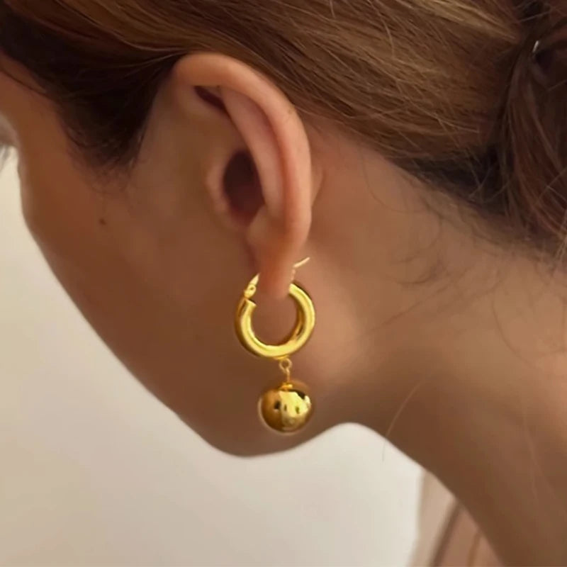 Statement Western Elegance: Chunky Gold Hoop Earrings with Ball Drop